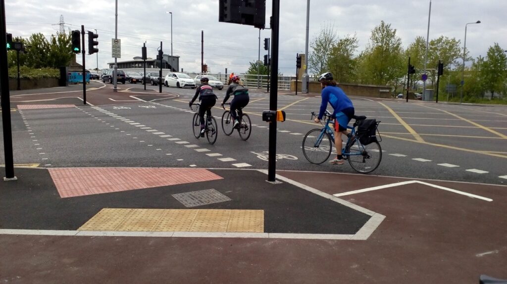 build a cycling culture image showing Lea Bridge Road, London